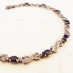 STERLING SILVER LAB CREATED SAPPHIRE OVAL CUT "INFINITY" LINK TENNIS BRACELET A